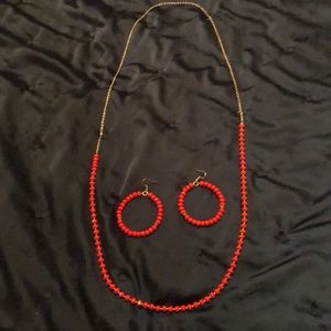 Orange/red beaded necklace and earrings